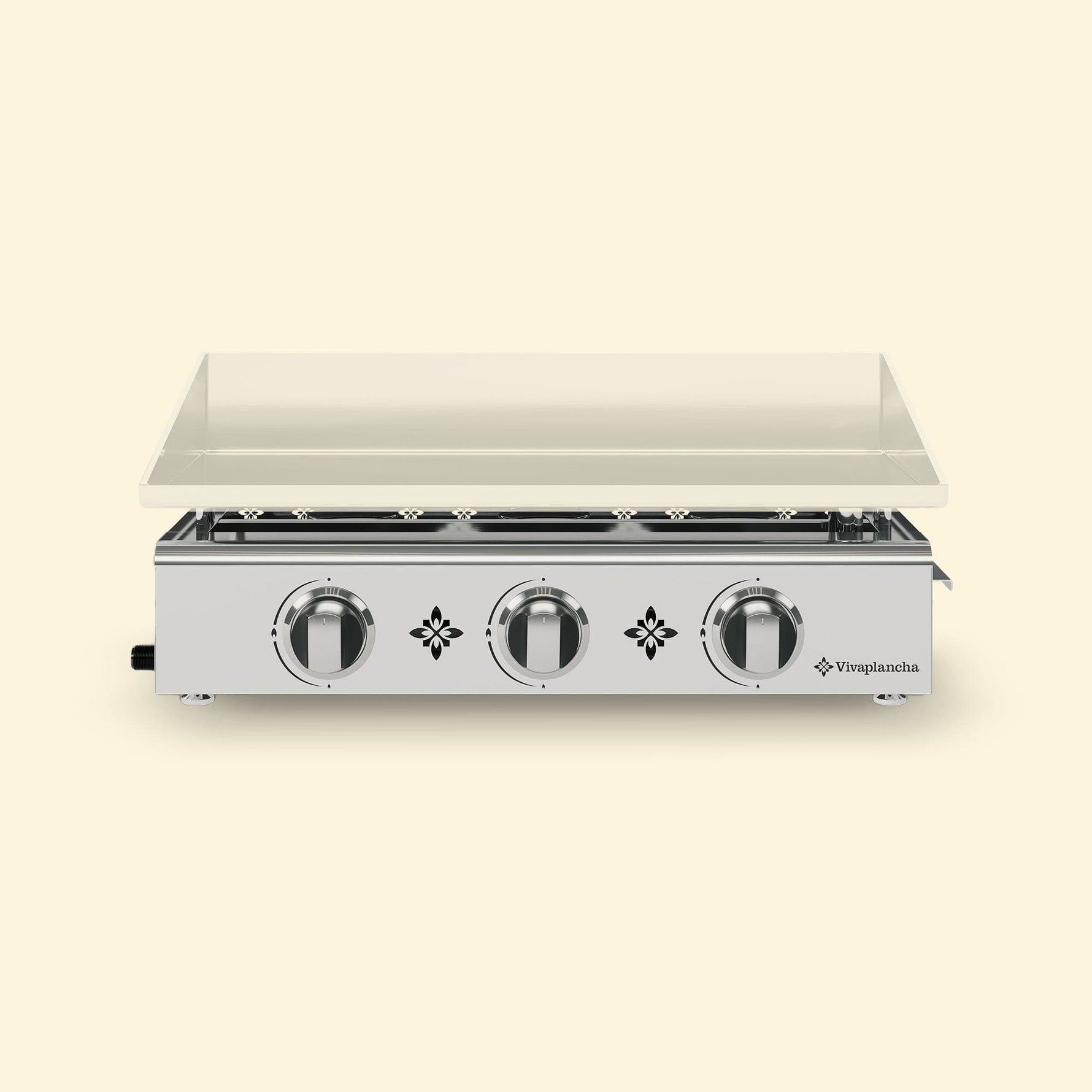 Plancha gaz Vivaplancha 3 brûleurs en inox, avec plaque de cuisson rectangulaire posée sur le châssis, présentée sur fond beige.