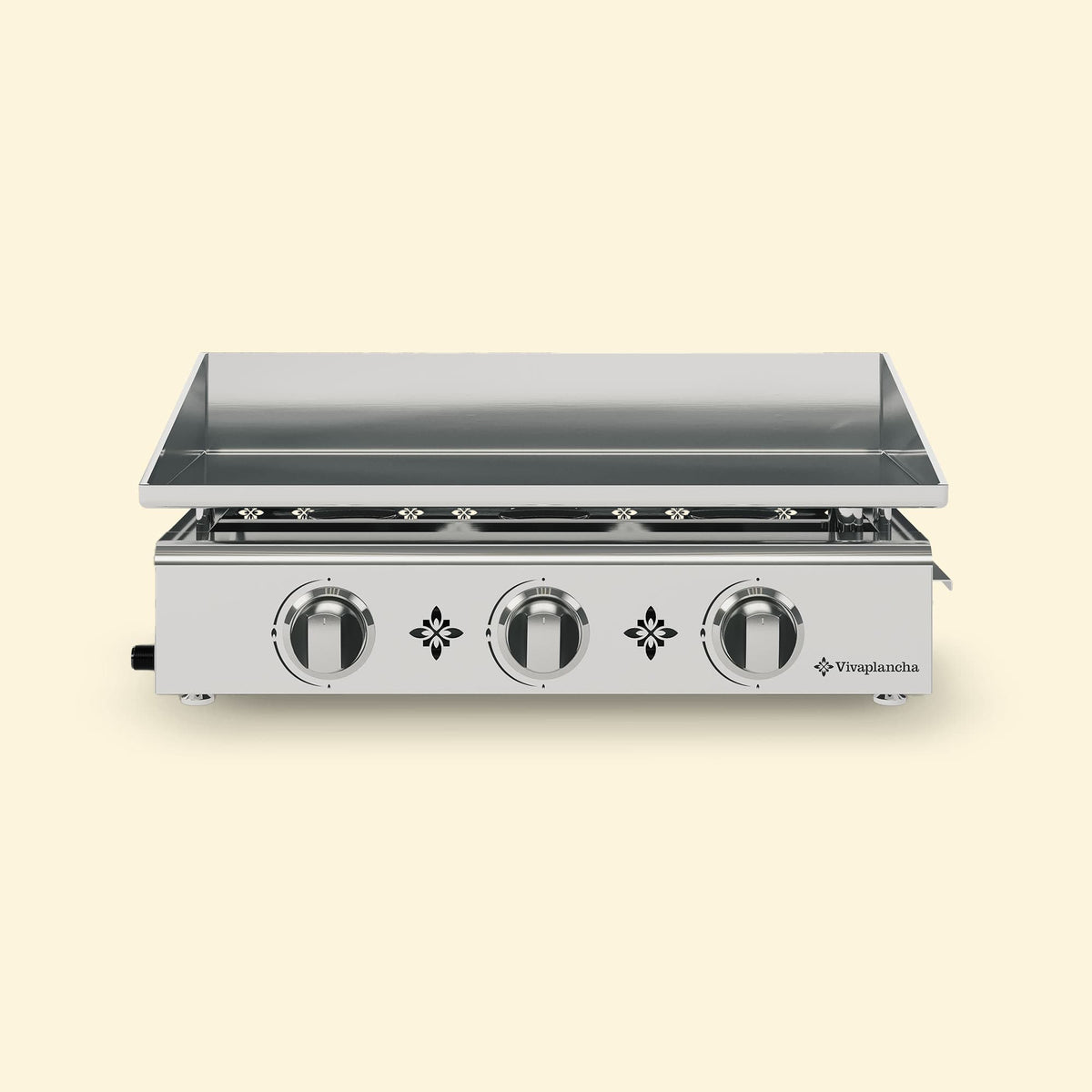 Plancha gaz Vivaplancha modèle Pimientos avec trois brûleurs en inox et plaque de cuisson en inox lisse, présentée de face sur fond uni beige.