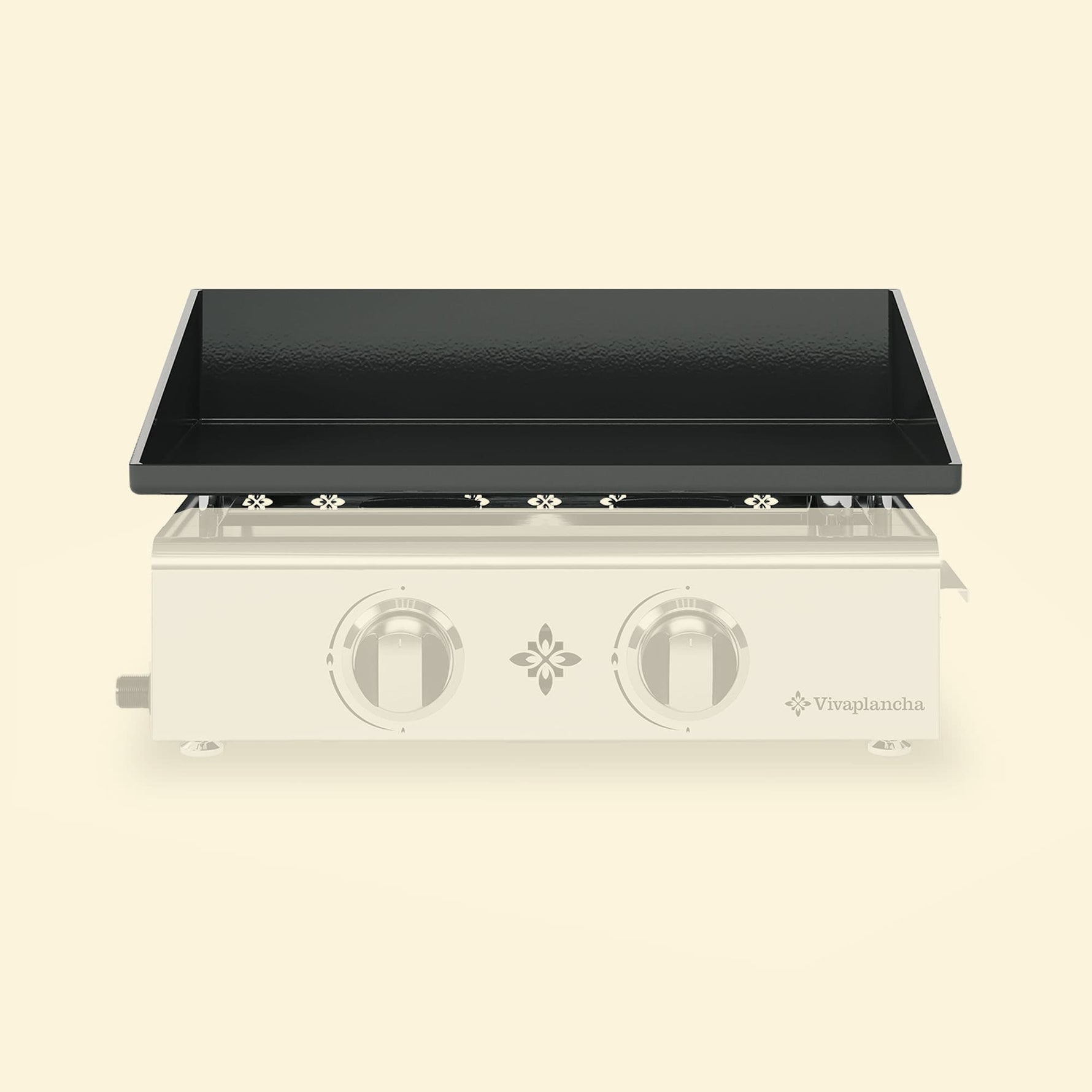 Plaque de cuisson émaillée noire pour plancha gaz 2 brûleurs Vivaplancha, présentée seule sur le châssis estompé, sur fond beige.